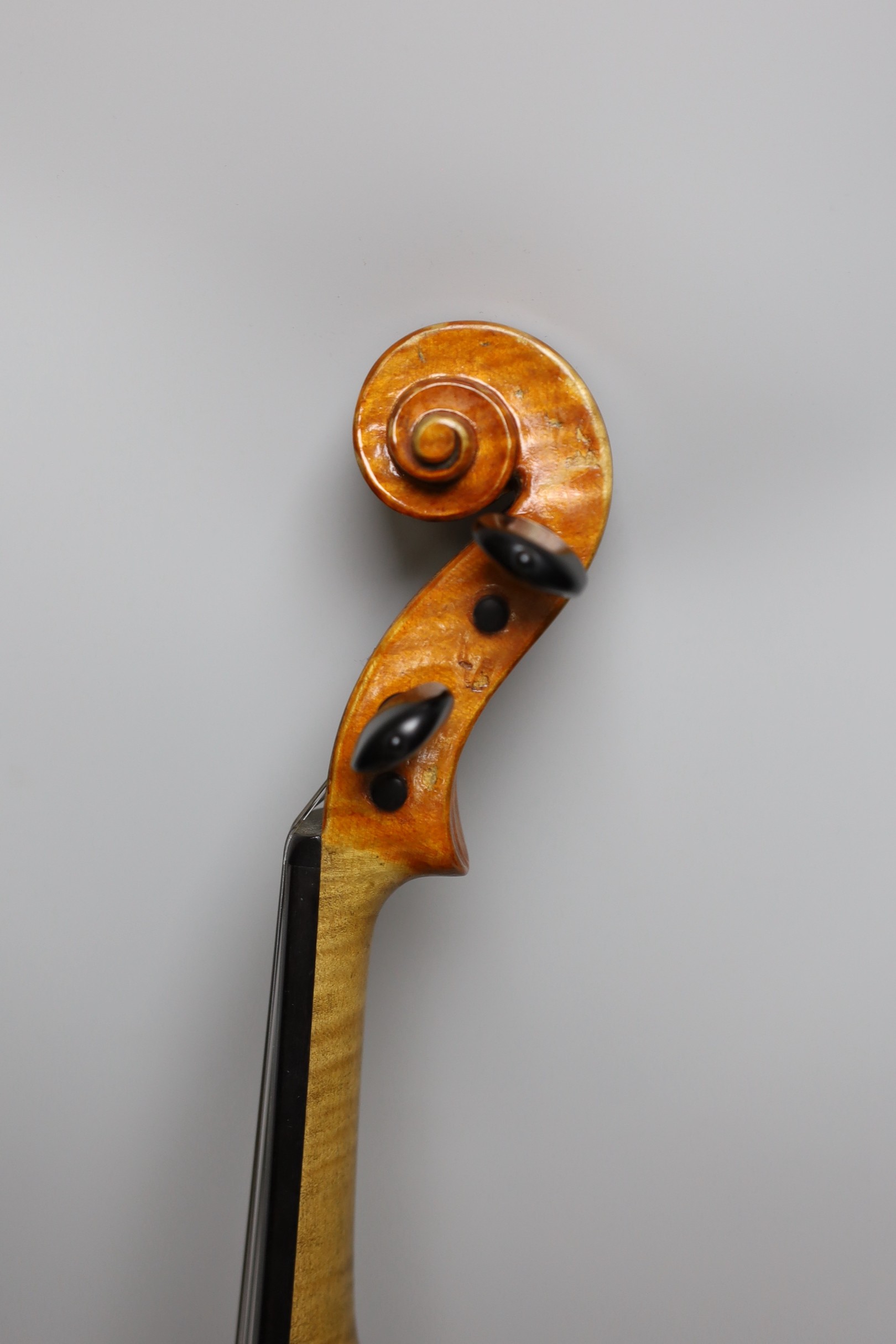 A cased violin, sound post loose